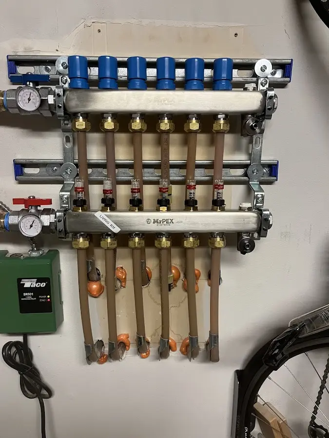 Plumber performing Leak Detection at a residential property in Paxton